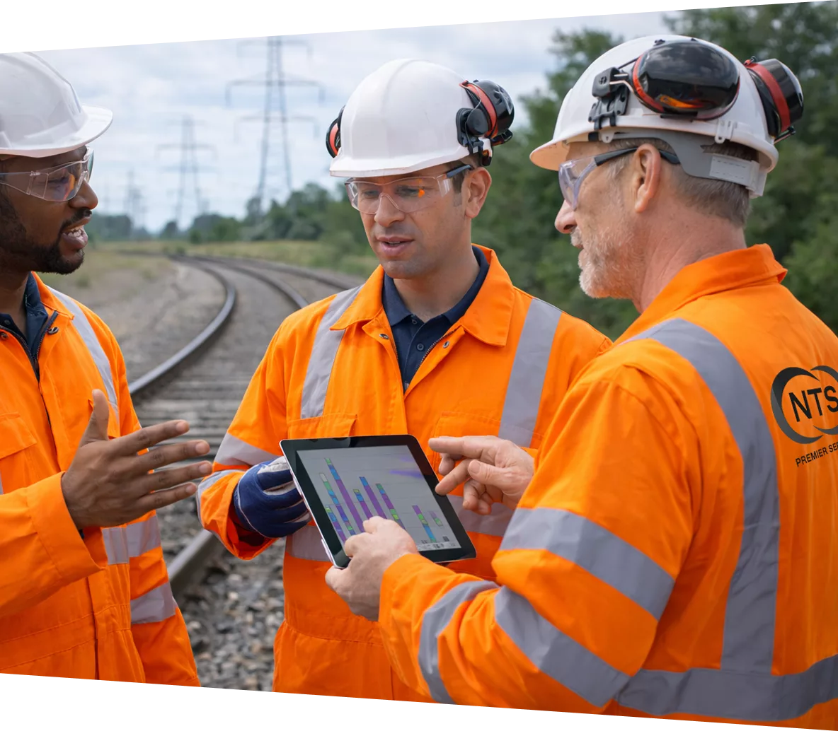 NTS Premier Services rail professionals discussing work on site